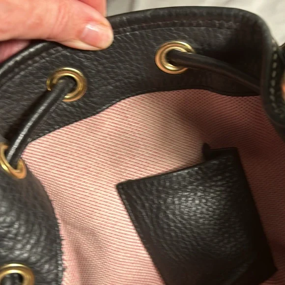 Dooney & Bourke Drawstring bag with tassels and duck tag. - Picture 10 of 12